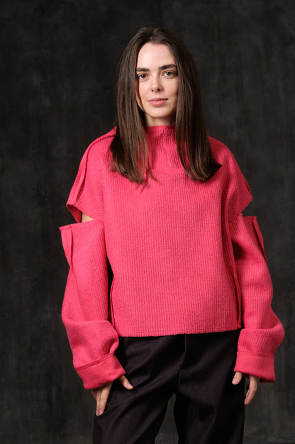 Ethnic sweater with black drape and pink geometry