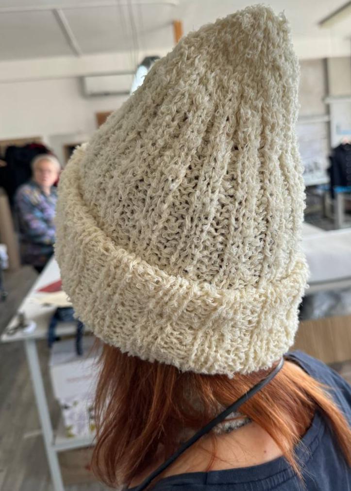 A bouclé wool hat with a lapel