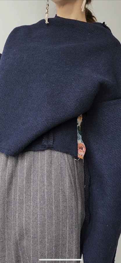 Blue wool sweater, open shoulders, with rose jacquard