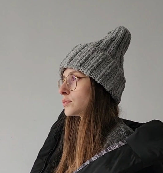 A bouclé wool hat with a lapel