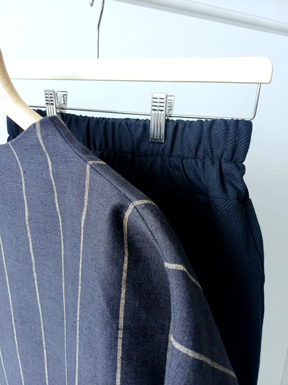 Top linen rack in a stripe