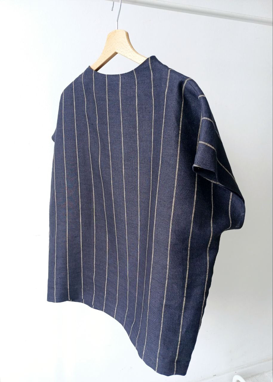 Top linen rack in a stripe