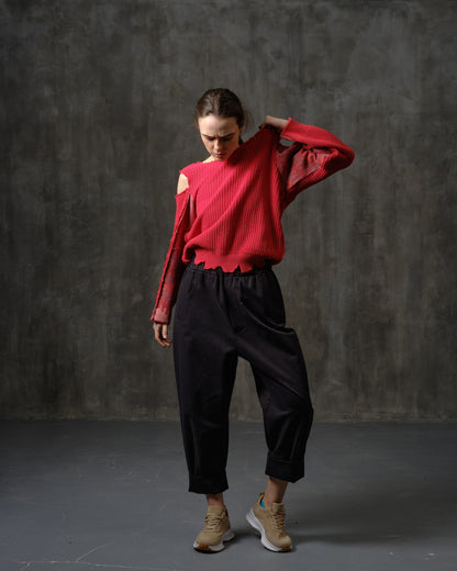 Reworked red cotton sweater with ornamented sleeves