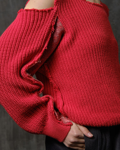 Reworked red cotton sweater with ornamented sleeves