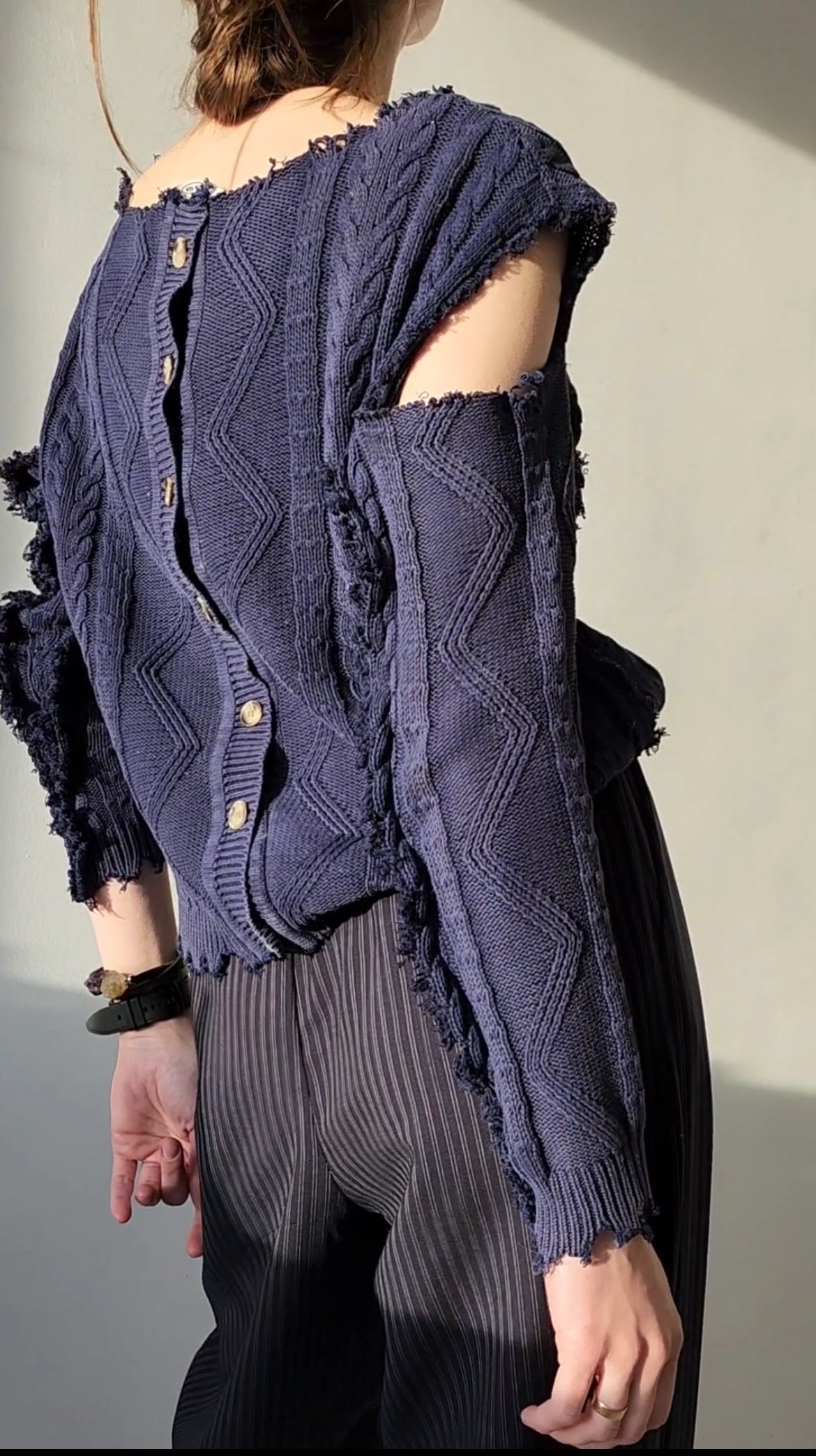Reworked black cotton sweater with denim sleeves