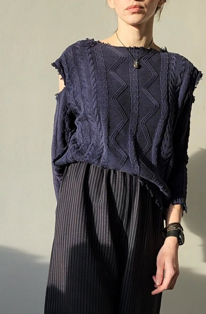 Reworked black cotton sweater with denim sleeves