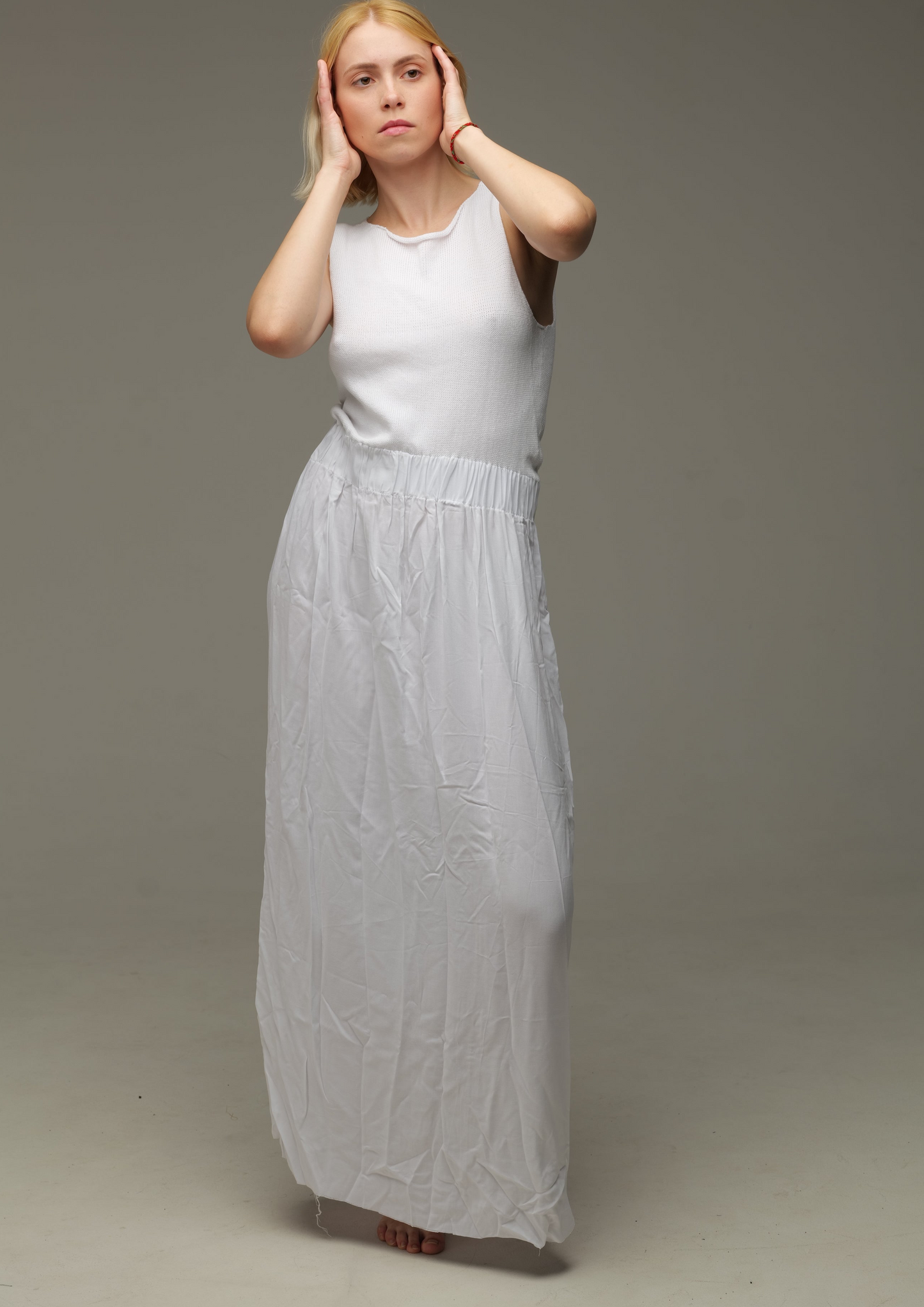 White cotton dress with a knitted bodice