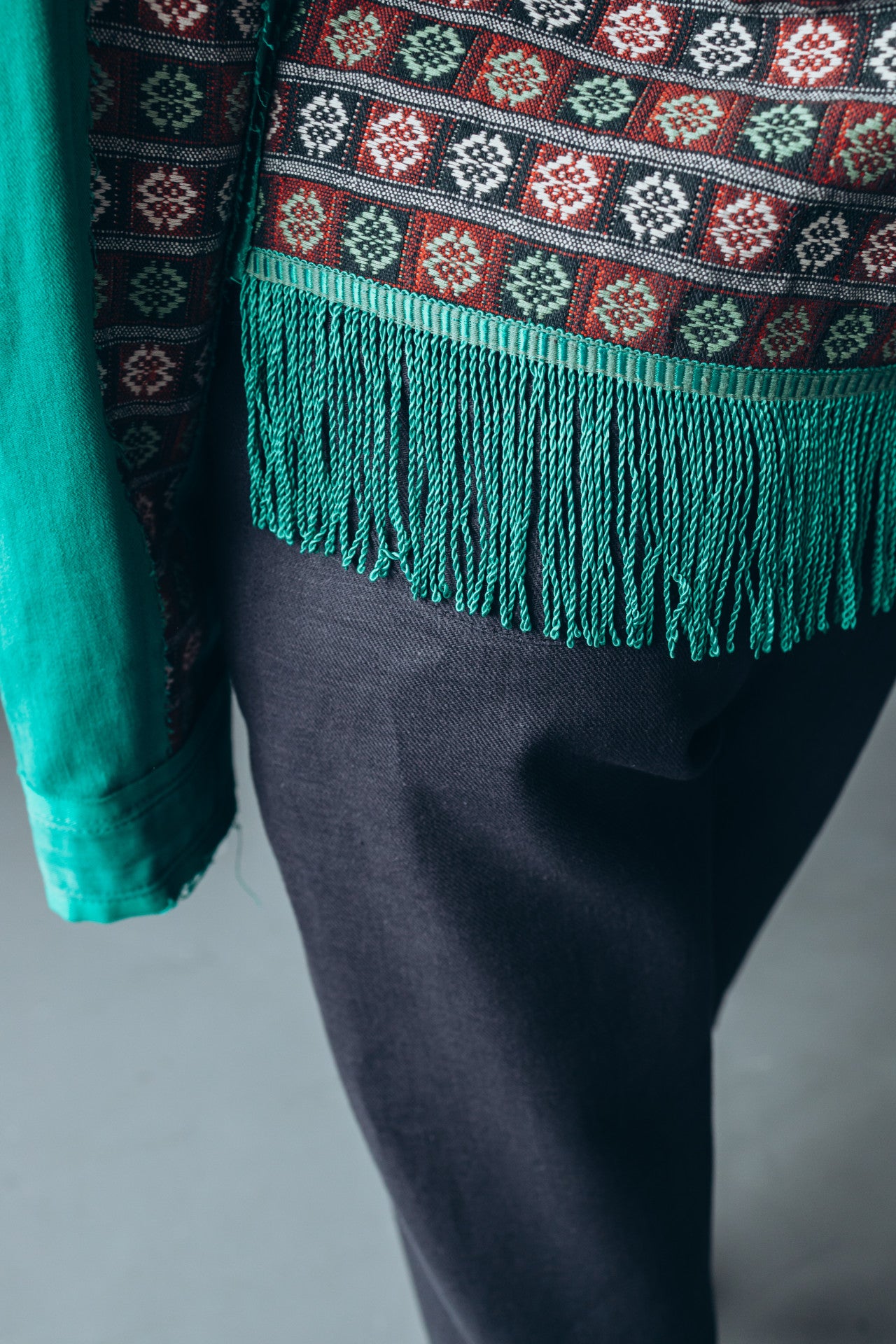 Reworked green denim shirt with a vintage ethnic back