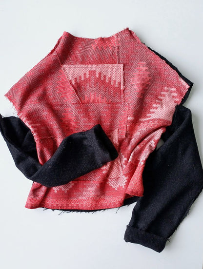 Sweater open shoulders black herringbone and red ornament