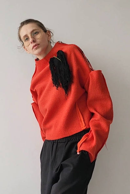Sweater open shoulders black herringbone and powder pink ornament