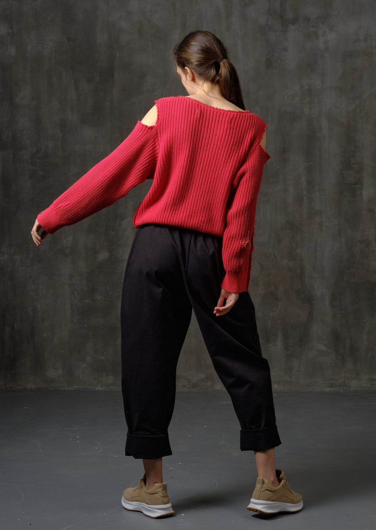 Reworked red cotton sweater with ornamented sleeves