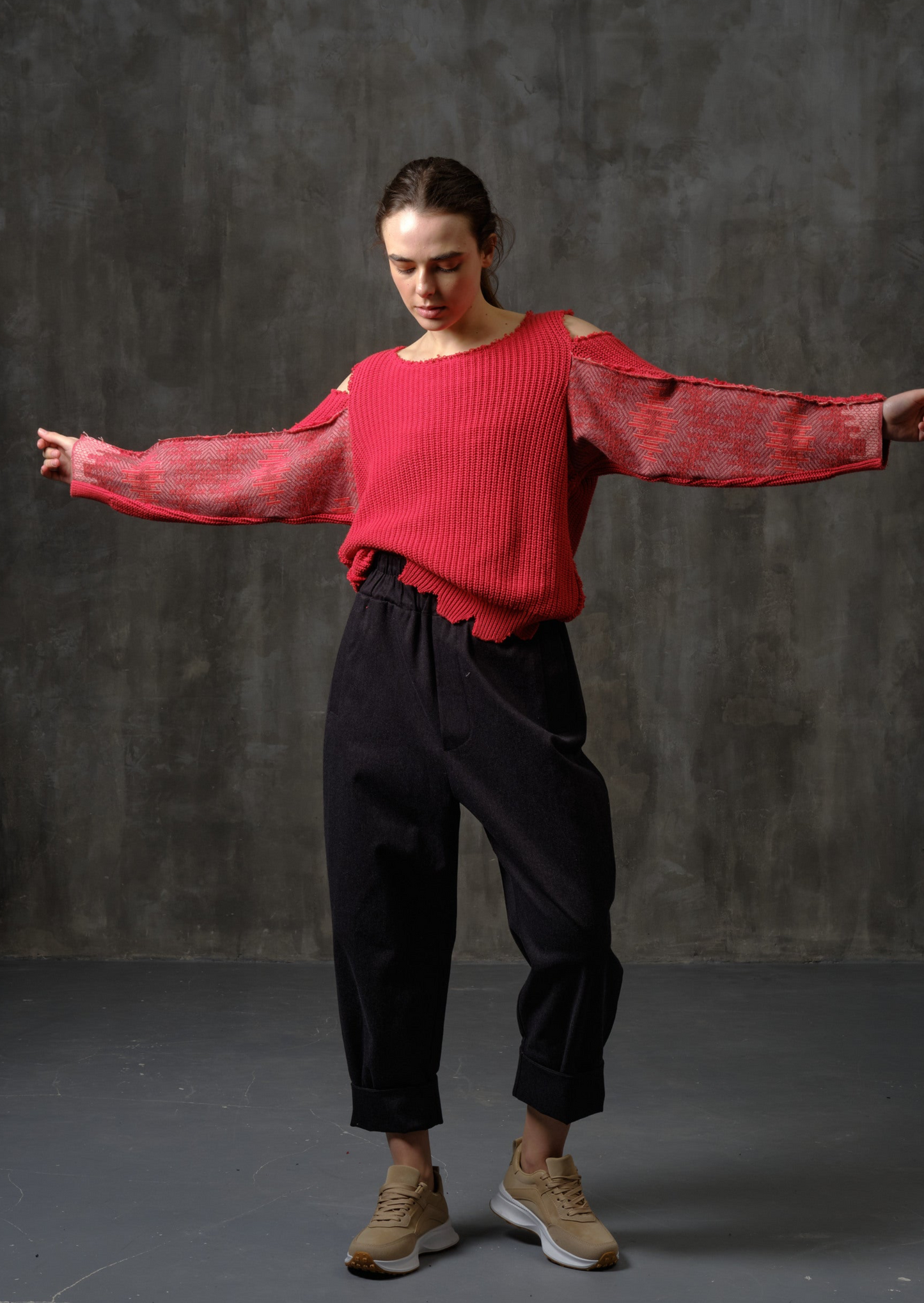 Reworked red cotton sweater with ornamented sleeves